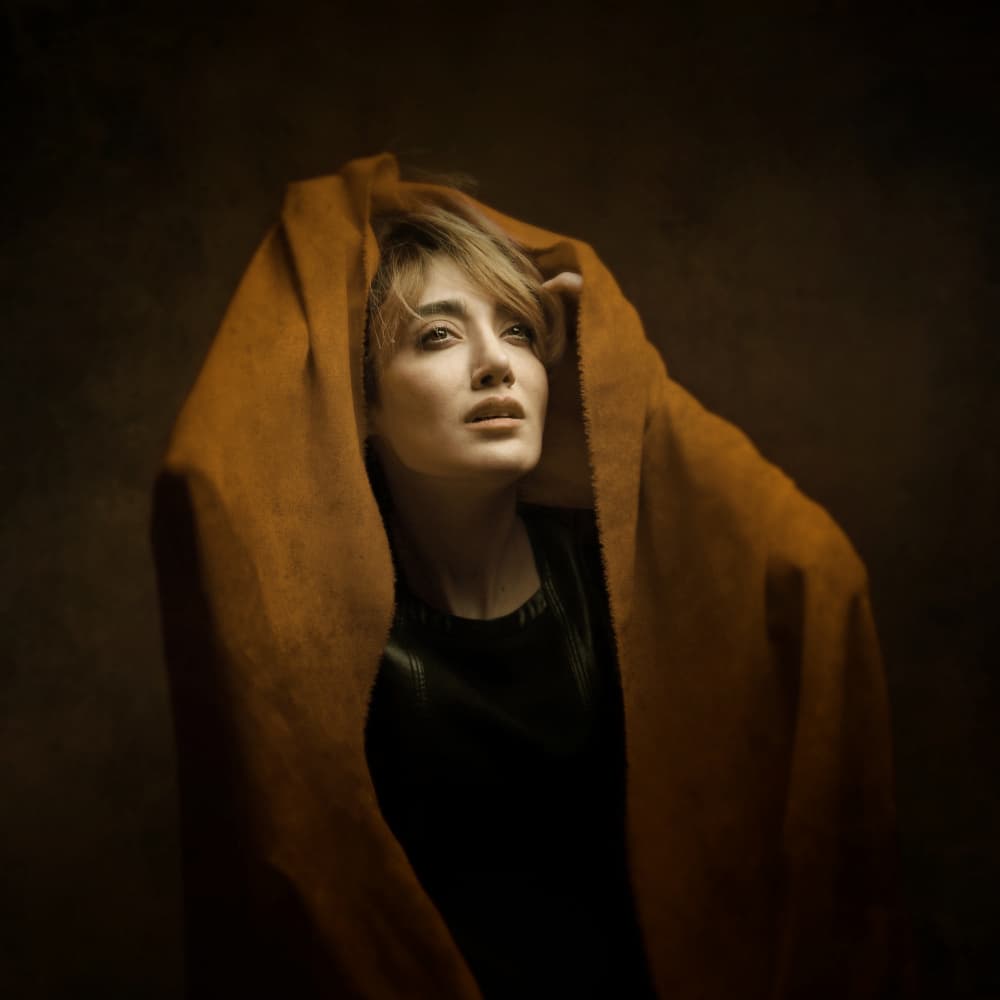 Contemplative Golden Gaze by Moein Hasheminasab — canvas wall art