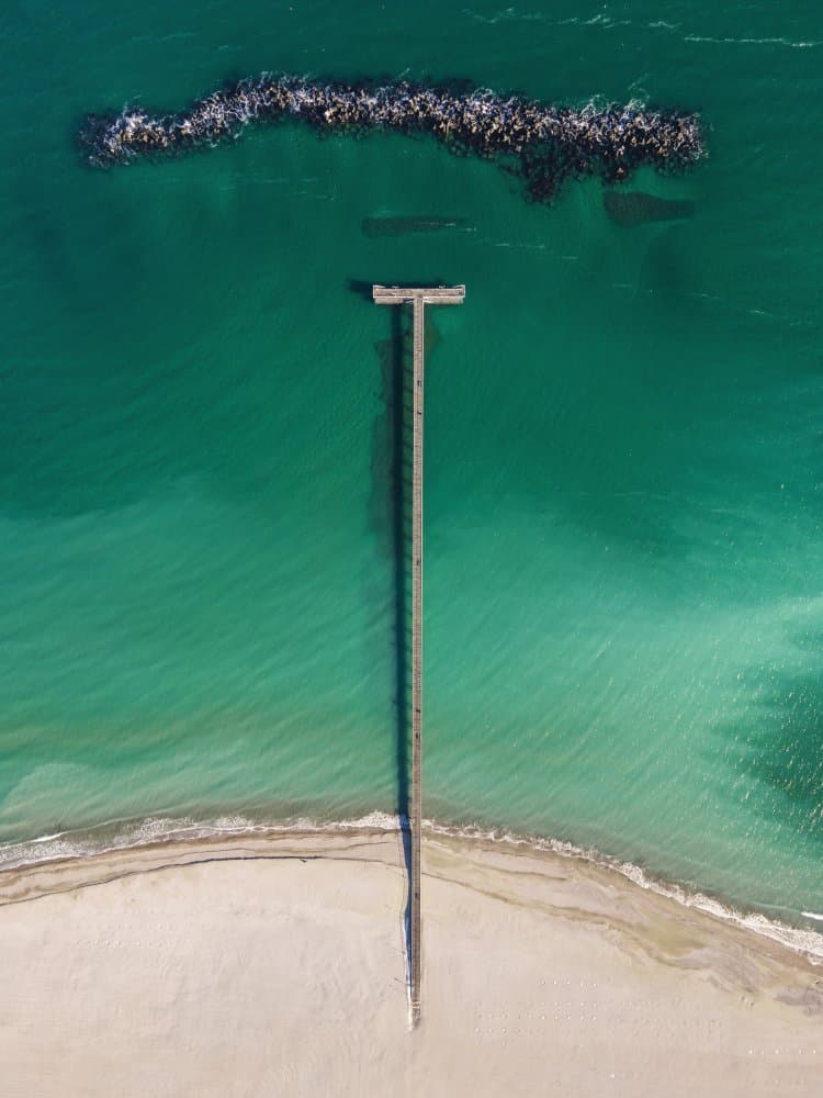 Aerial Beach Pier by Dan Mirica — canvas wall art