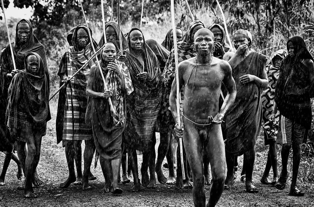 African Tribal Procession by Joxe Inazio Kuesta Garmendia — canvas wall art