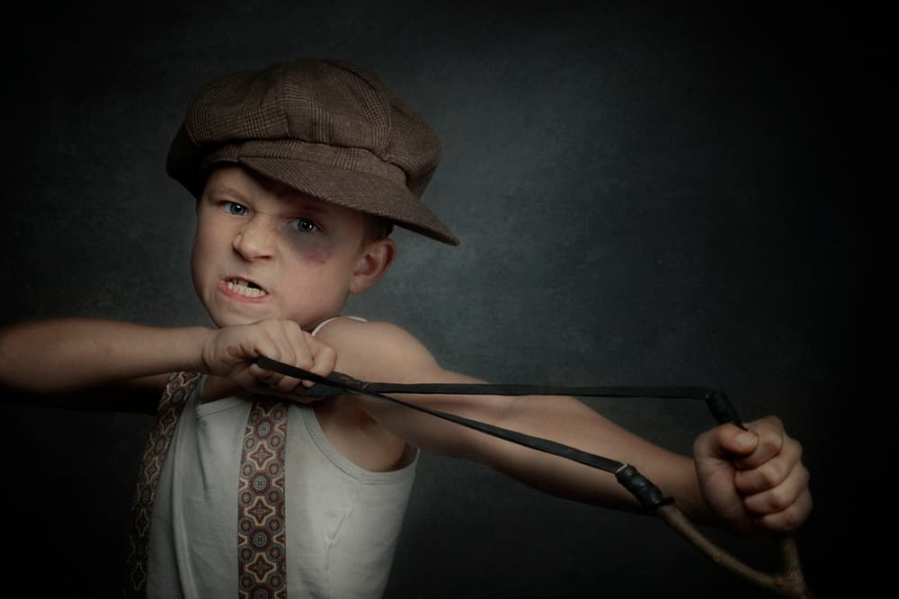 Defiant Boy With Slingshot by Monika Vanhercke — canvas wall art