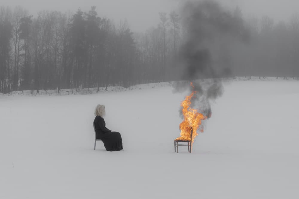 Figure By Burning Chair by Leszek Paradowski — canvas wall art