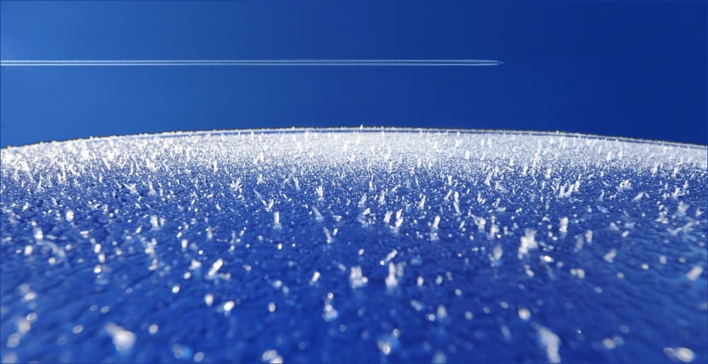 Airplane Over Frosty Crystals by Huib Limberg — canvas wall art