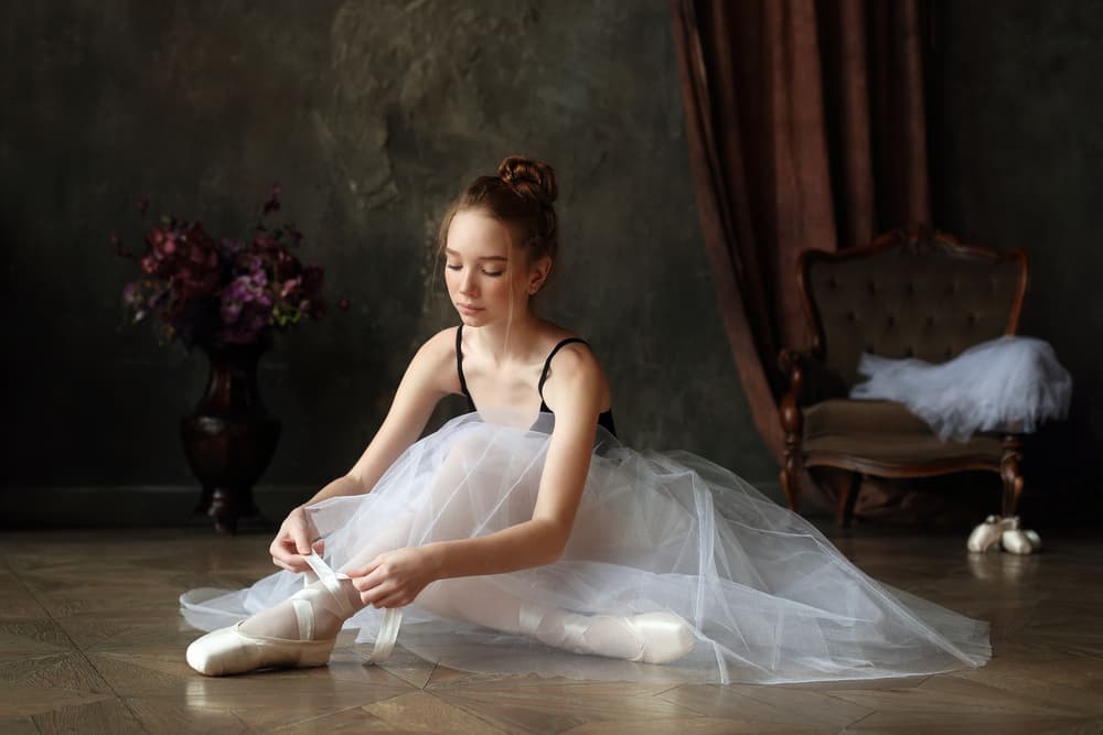 Ballerina Tying Pointe by Victoria Glinka — canvas wall art
