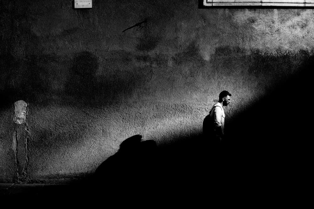 Man In Urban Shadow by Antonio Grambone — canvas wall art
