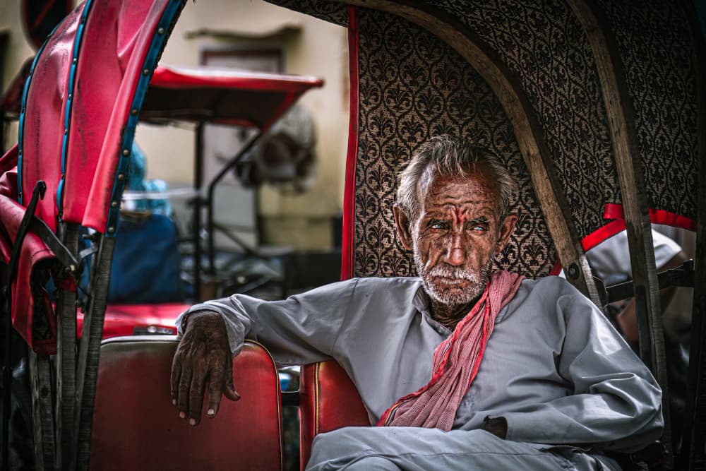 Elderly Man In Rickshaw by Marco Tagliarino — canvas wall art