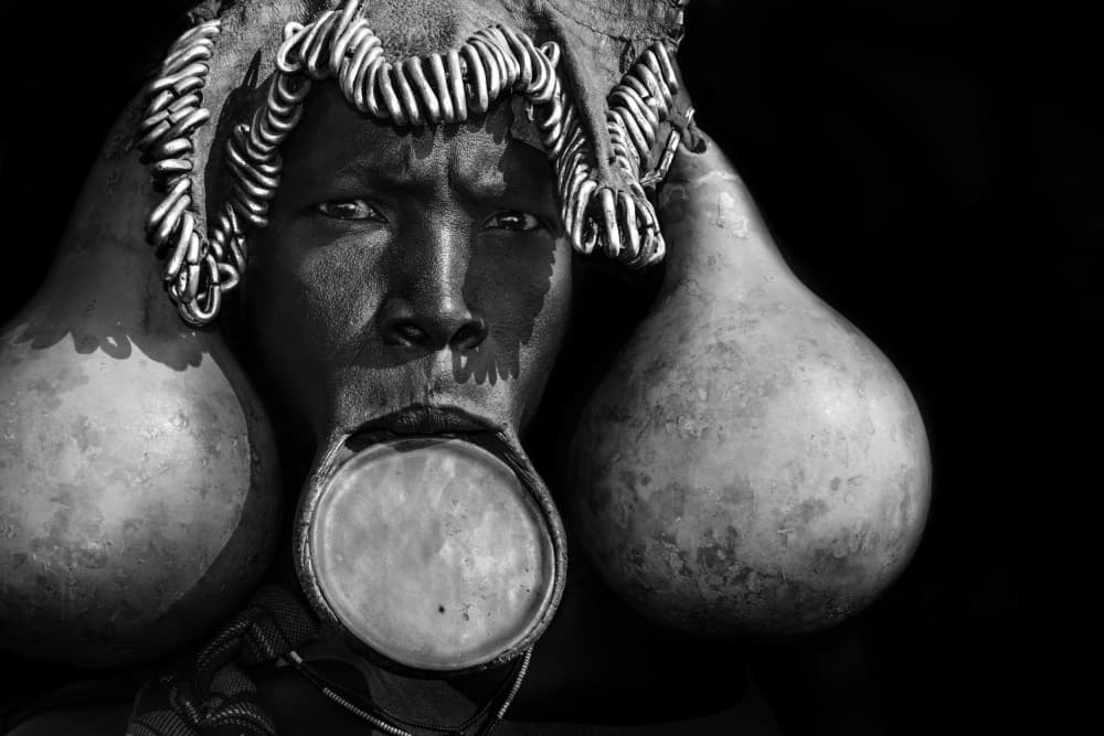 African Lip Plate Portrait by Irene Perovich — canvas wall art