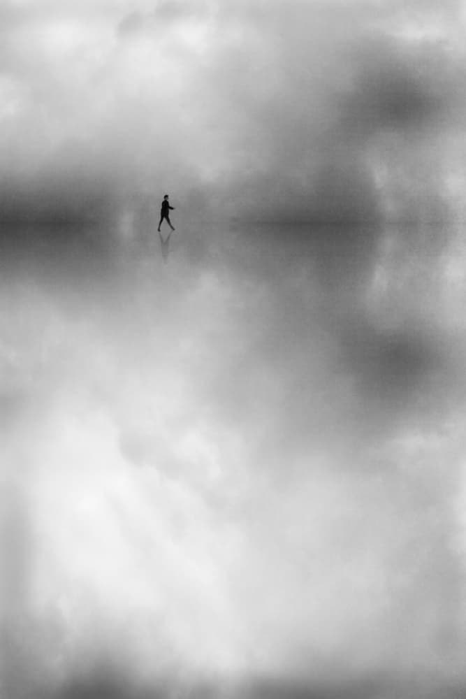 Man Walking Reflection by Roswitha Schleicher-Schwarz — canvas wall art