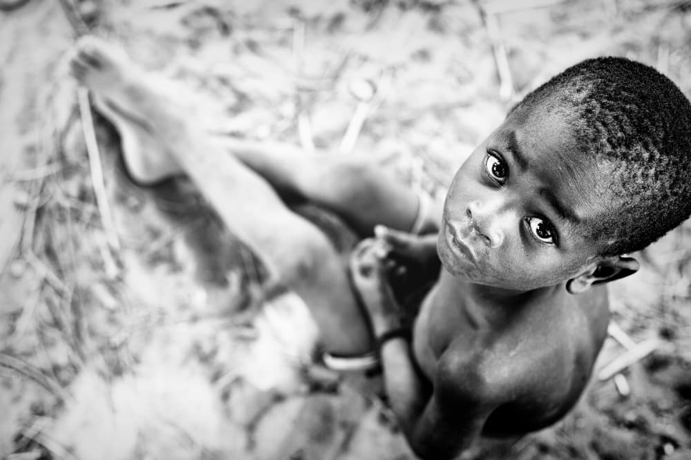 Young Boy's Gaze by Gina Buliga — canvas wall art