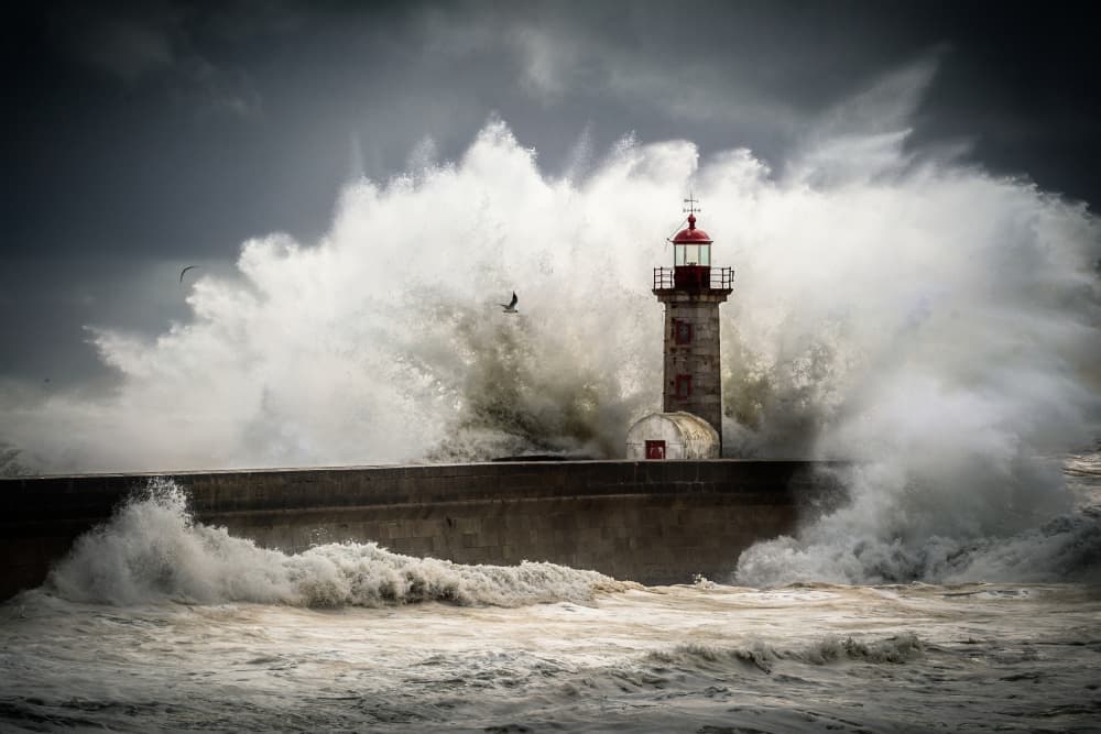 Stormy Lighthouse Waves by Marco Faria — canvas wall art