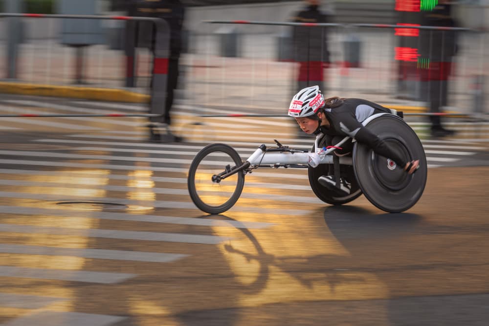 Dynamic Wheelchair Racing by Deming W — canvas wall art