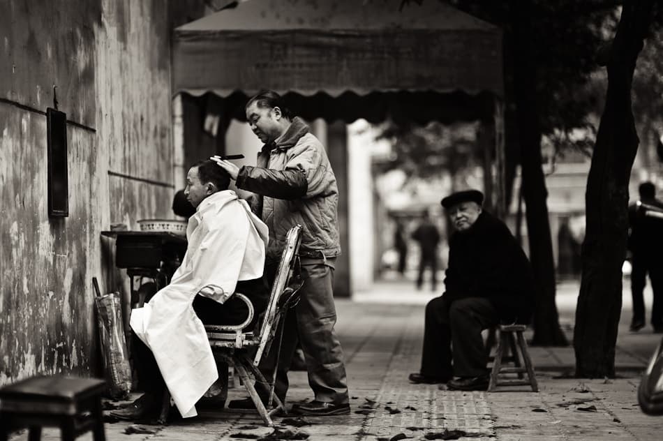 Street Barber Scene by Nicolas Marino — canvas wall art