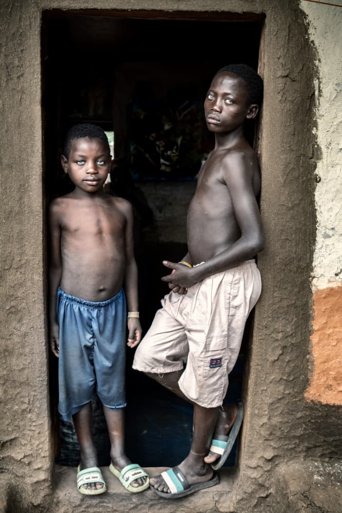 Boys In Rustic Doorway by Trevor Cole — canvas wall art