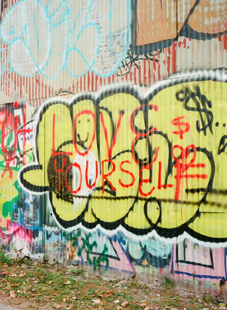 Love Yourself Graffiti Wall by Bethany Young — canvas wall art