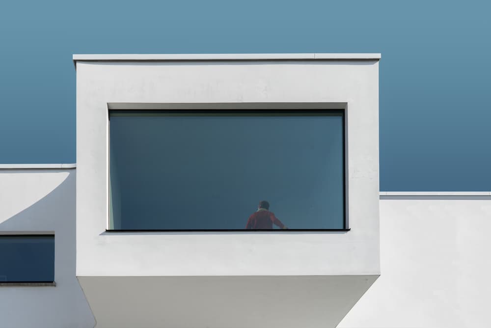 Lone Figure Window View by Luc Vangindertael (laGrange) — canvas wall art