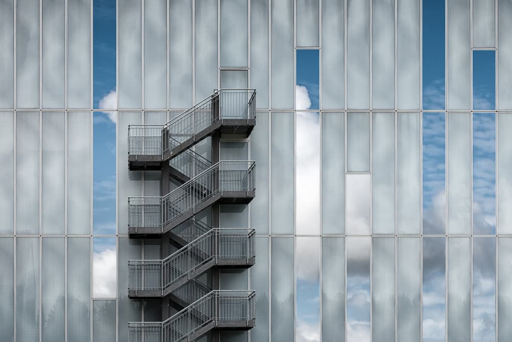 Modern Fire Escape Reflections by Michiel Hageman — canvas wall art