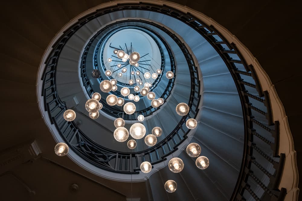 Grand Spiral Staircase Lights by Linda Wride — canvas wall art