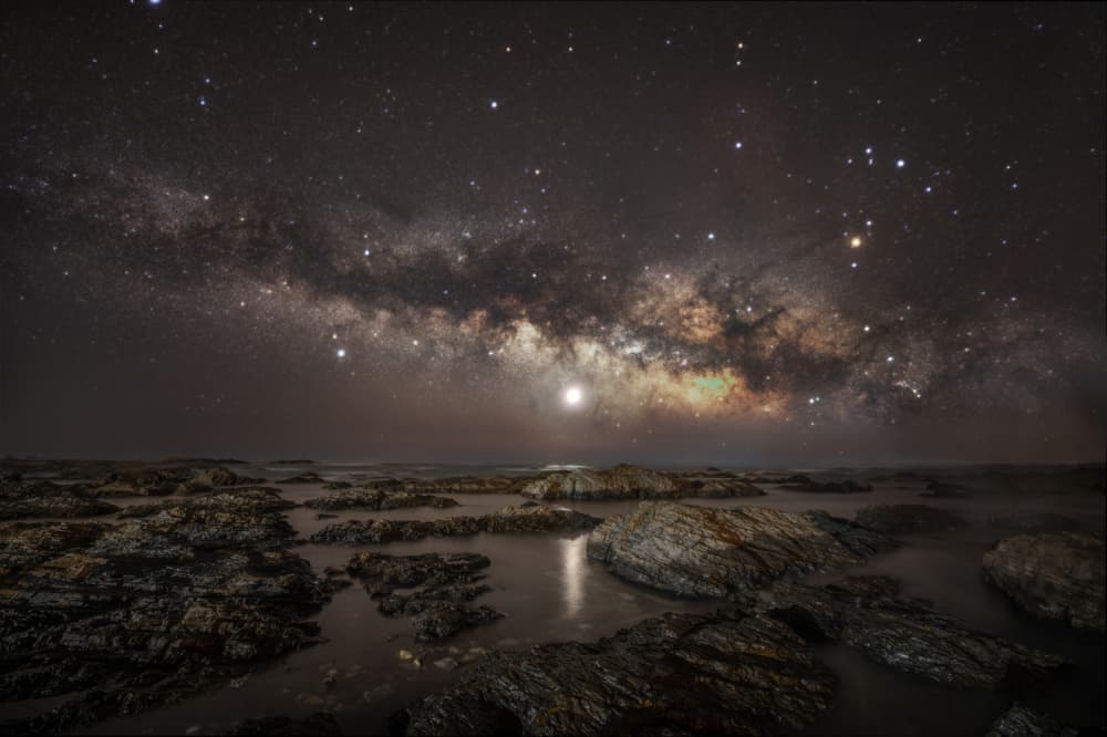 Milky Way Over Ocean Rocks by まちゅばら/Hiroki Matsubara — canvas wall art