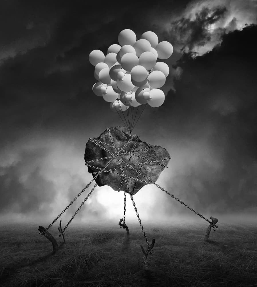 Balloons Lifting Chained Rock by Hari Sulistiawan — canvas wall art