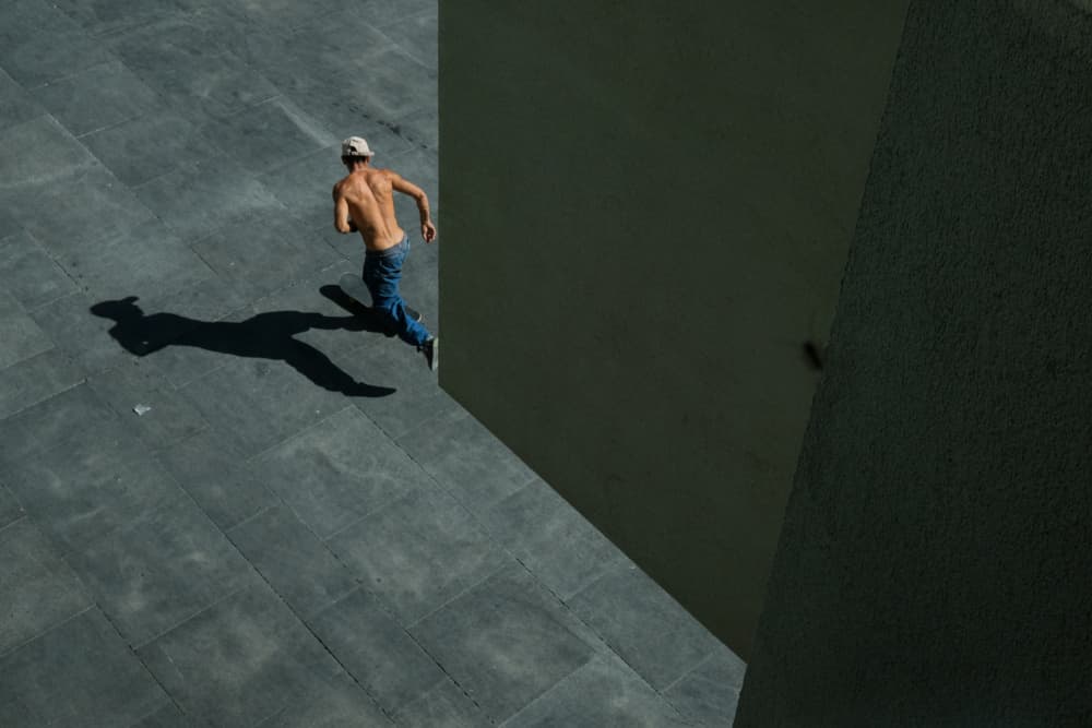 Urban Runner's Shadow by Bego Amare — canvas wall art