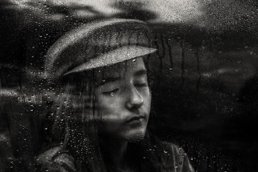 Pensive Girl In Rain by Ummu Nisan Kandilcioglu — canvas wall art