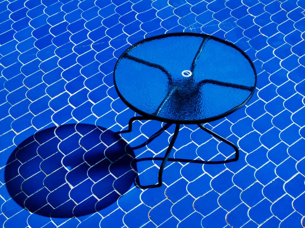 Blue Tile Table Shadow by Rolf Endermann — canvas wall art