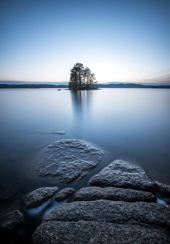 Still Lake Island by Christian Lindsten — canvas wall art