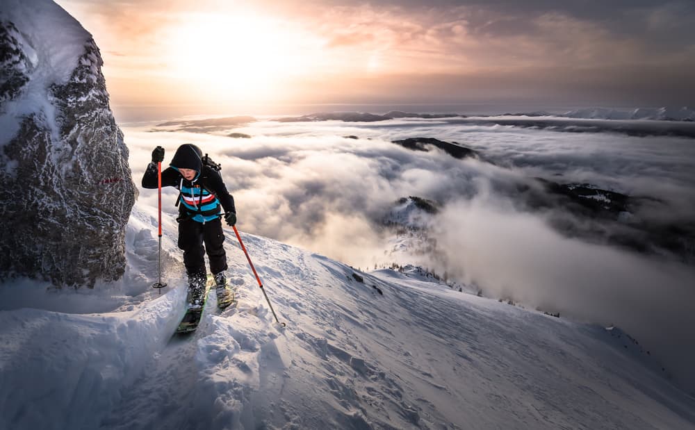 Skiing Above Clouds by Sandi Bertoncelj — canvas wall art