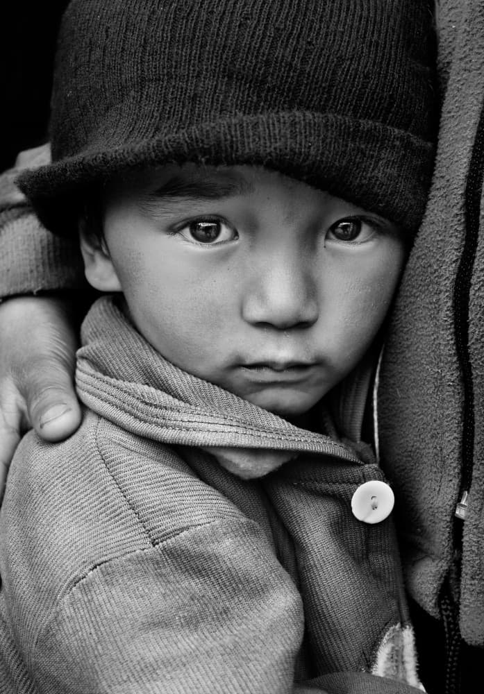 Young Boy Pensive Gaze by Nilesh J. Bhange — canvas wall art