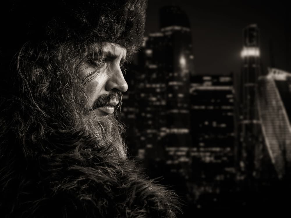 Pensive Man City Night by Oles Paritskiy — canvas wall art