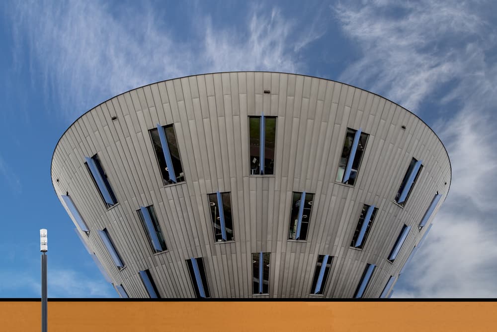 Modern Round Building by Theo Luycx — canvas wall art