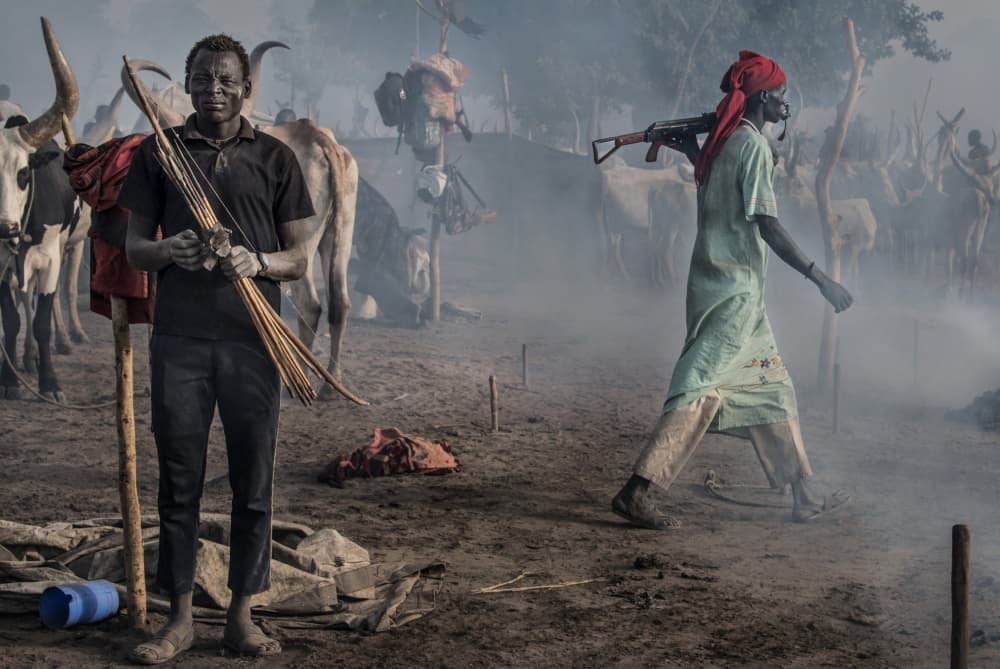 Dinka Men Cattle Camp by Joxe Inazio Kuesta Garmendia — canvas wall art