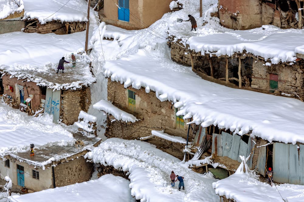 Snowy Mountain Village Life by Mohammadreza Momeni — canvas wall art