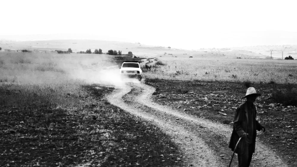 Man Car Dusty Road by Paco Palazon — canvas wall art