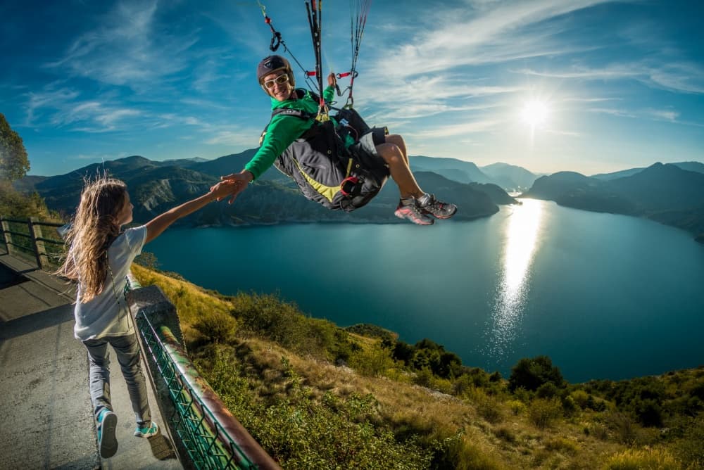 Paragliding Lake Connection by Tristan Shu — canvas wall art