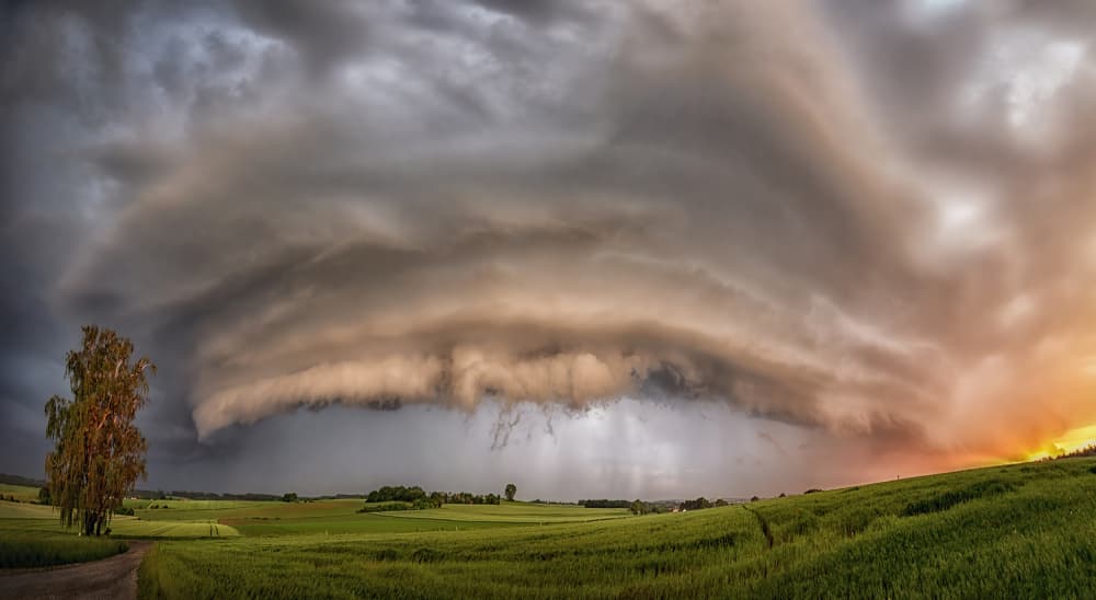Dramatic Sky Over Fields by Corry DeLaan — canvas wall art
