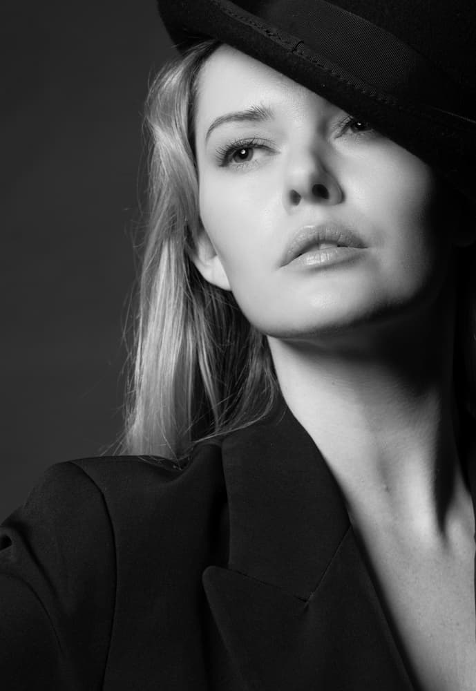 Elegant Woman In Hat by Colin Dixon — canvas wall art