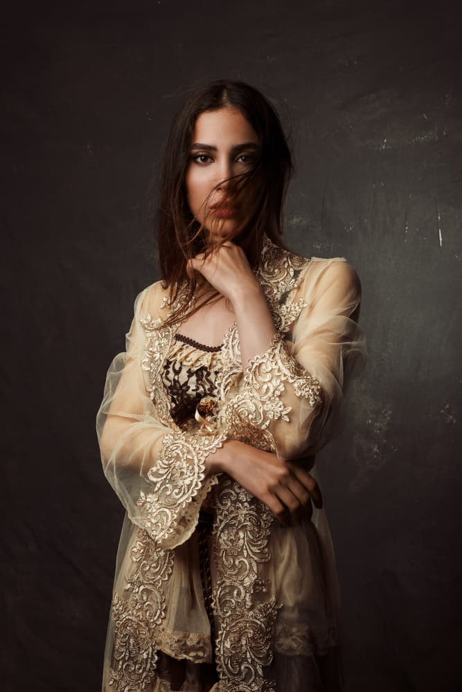 Woman in Golden Lace by Mehdi Mokhtari — canvas wall art