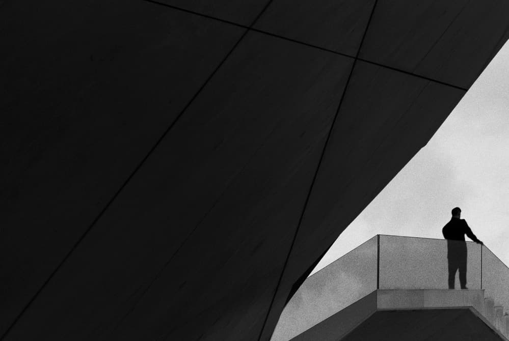 Man on Modern Balcony by Paulo Abrantes — canvas wall art