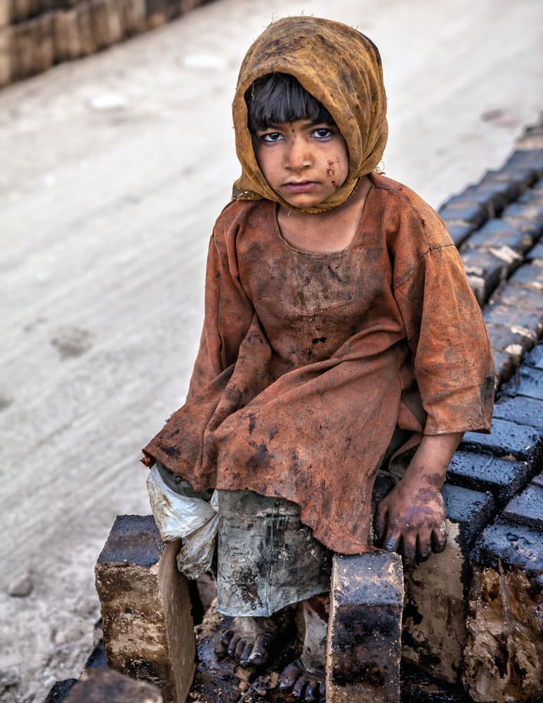 Solemn Child Portrait by Mohammadreza Momeni — canvas wall art