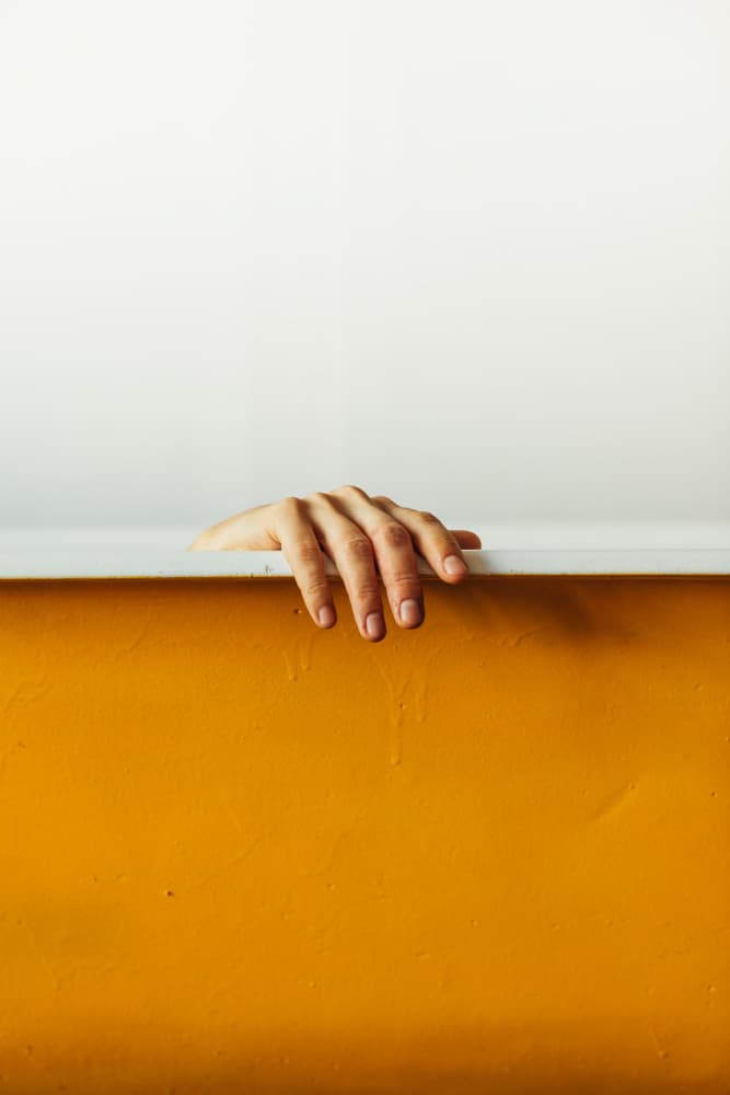 Hand on Bathtub Edge by Javier Pardina — canvas wall art