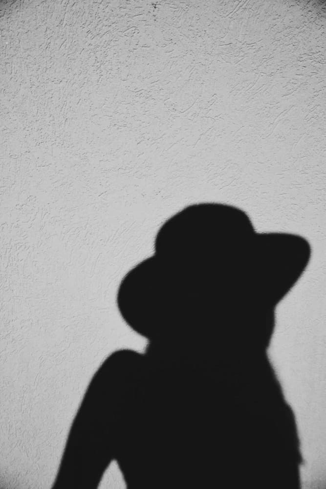 Elegant Hat Shadow by Del Mundo Imagery — canvas wall art
