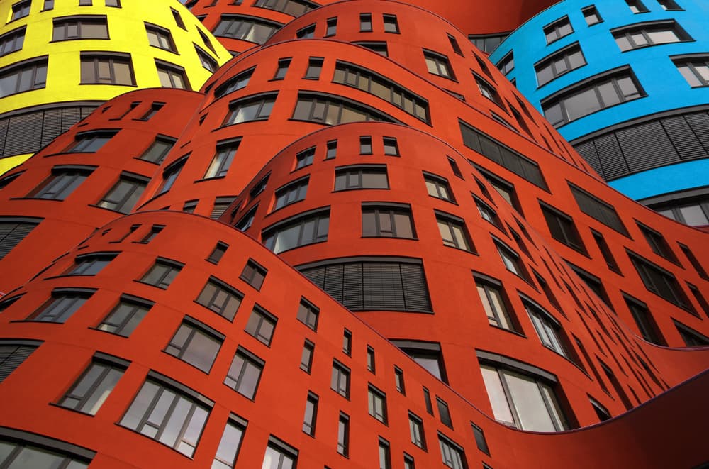 Colorful Wavy Buildings by Hans-Wolfgang Hawerkamp — canvas wall art