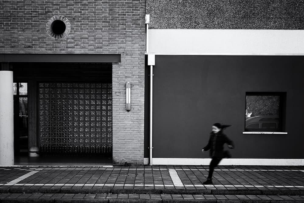 Dynamic City Runner by Massimo Della Latta — canvas wall art
