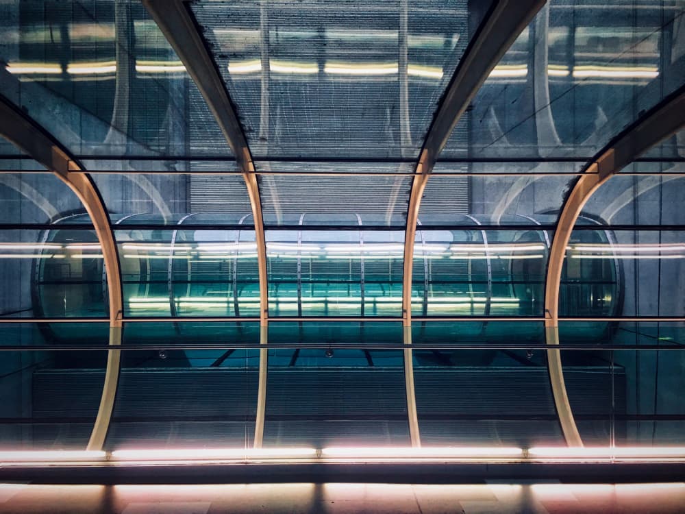 Glass Tunnel Reflections by Yohan Borca — canvas wall art
