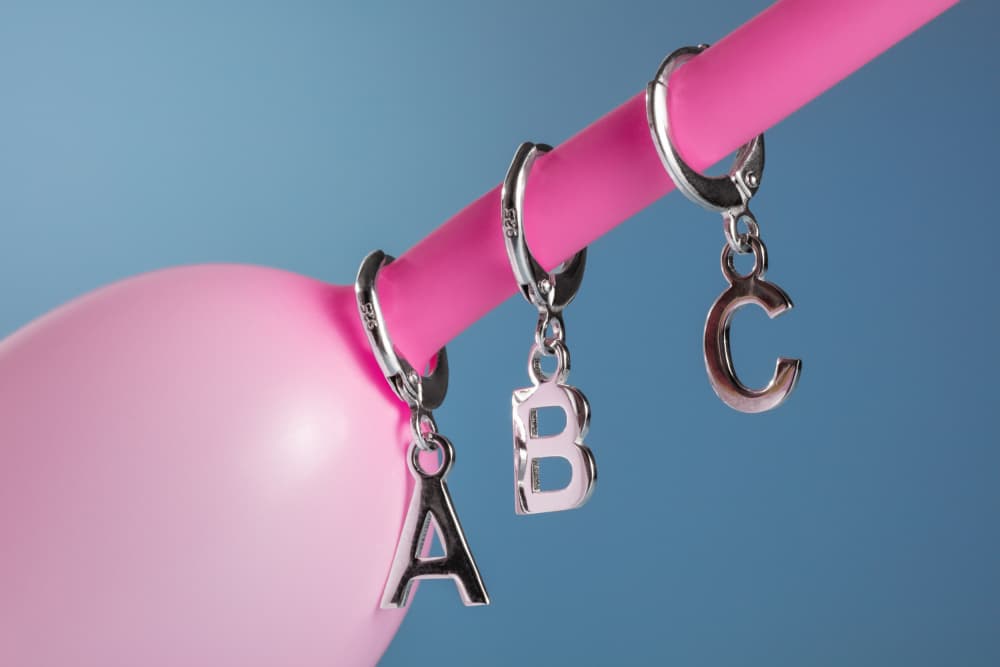 Pink Balloon Alphabet by Julia Ramiro — canvas wall art