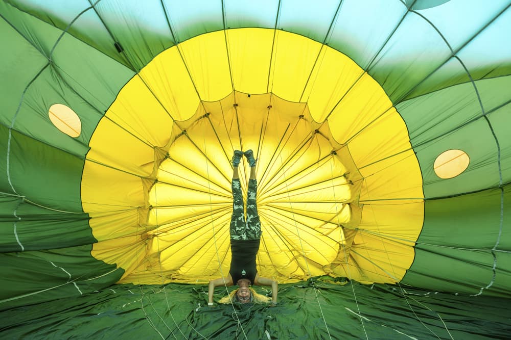 Hot Air Balloon Headstand by Michael Eßig — canvas wall art