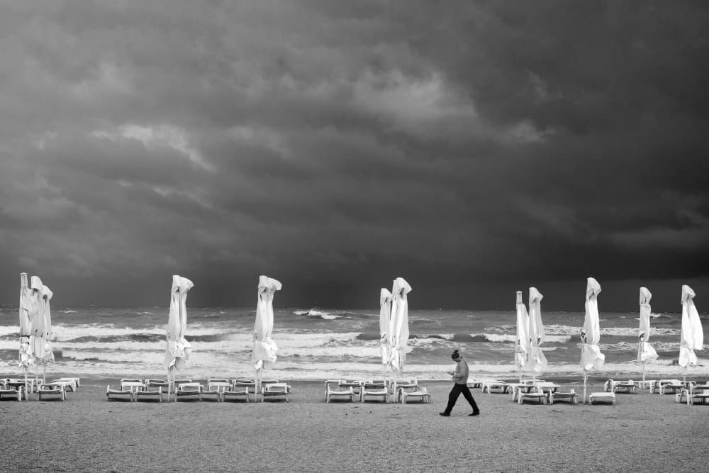 Stormy Beach Solitude by Marius Cinteza — canvas wall art