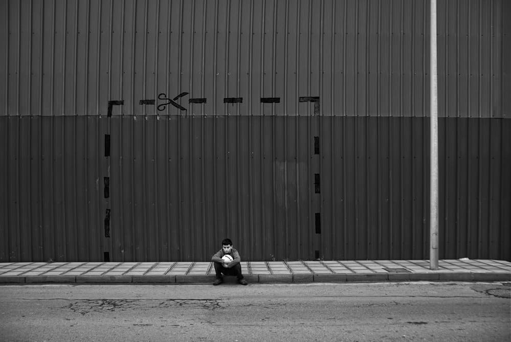 Solitary Boy Urban Wall by Jose C. Lobato — canvas wall art