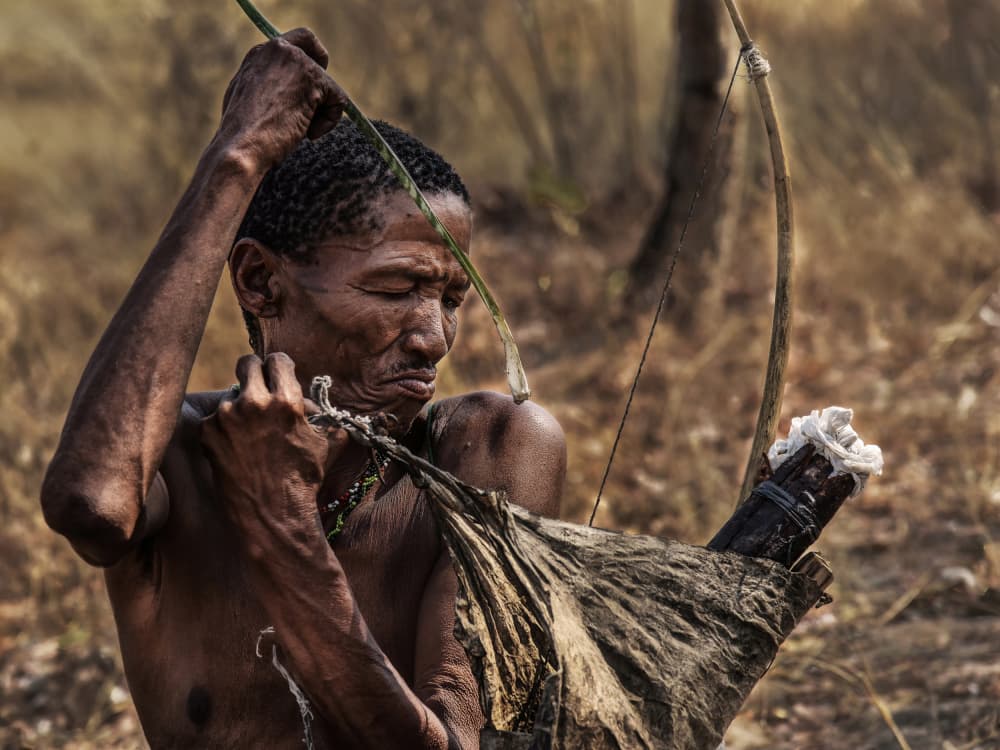 Bushman Hunter with Bow by Irene Perovich — canvas wall art