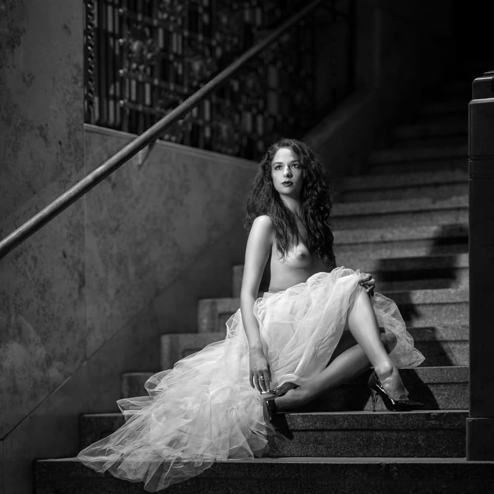 Bare Elegance on Steps by Angéla Vicedomini — canvas wall art
